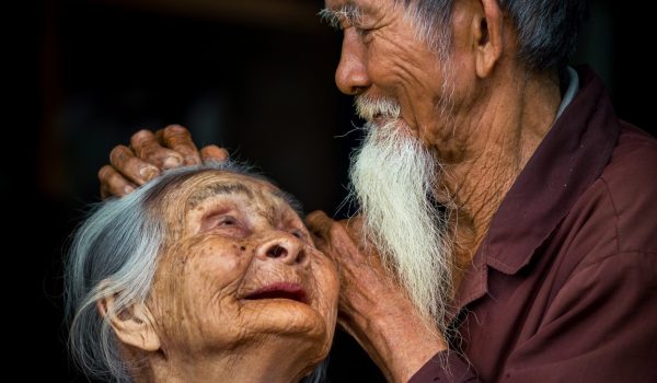 hoi vietnam mar 14 2018 detailed close up portrait asian couple with black background scaled